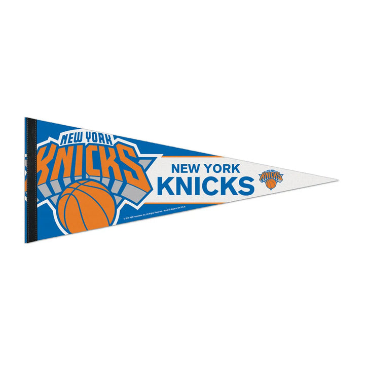 The NBA Premium Felt Pennant is a triangular New York Knicks pennant featuring the team's logo with an orange basketball and blue lettering on a white and blue background.