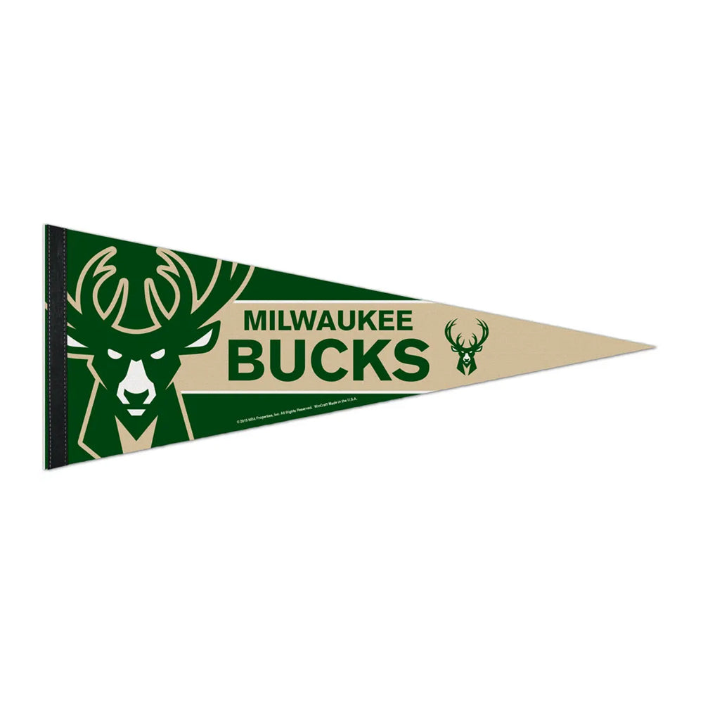 An NBA Premium Felt Pennant for the Milwaukee Bucks displays the team’s deer logo and MILWAUKEE BUCKS text on a green and tan background.