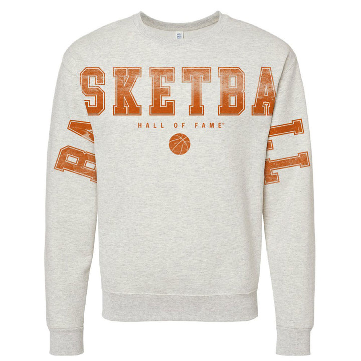 The Basketball Hall of Fame® Spread Arms Fleece Sweatshirt features light gray fleece, bold orange "SKETBA" lettering on the front, partial “LL” on each sleeve, a basketball graphic, and “HALL OF FAME” in orange—ideal for basketball fans.