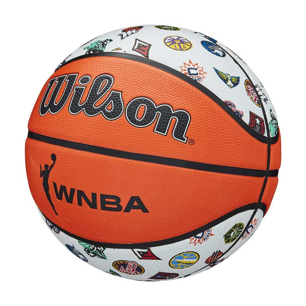 The Wilson WNBA All Team Basketball features an orange and white design with colorful WNBA team logos on the white panels, making it a vibrant and kid-friendly choice for young fans.