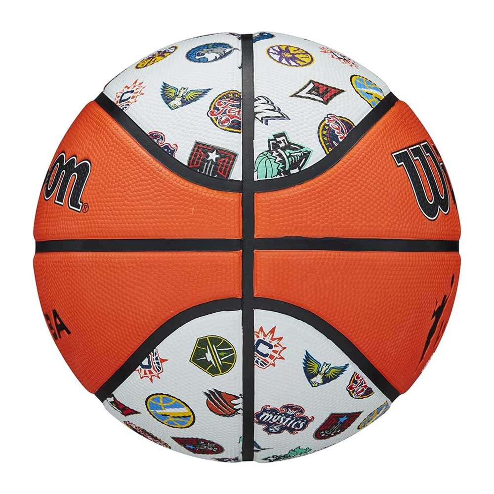The Wilson WNBA All Team Basketball features white panels with colorful WNBA team logos, classic orange panels, black lines, and the Wilson logo on two sides—perfect for kids.