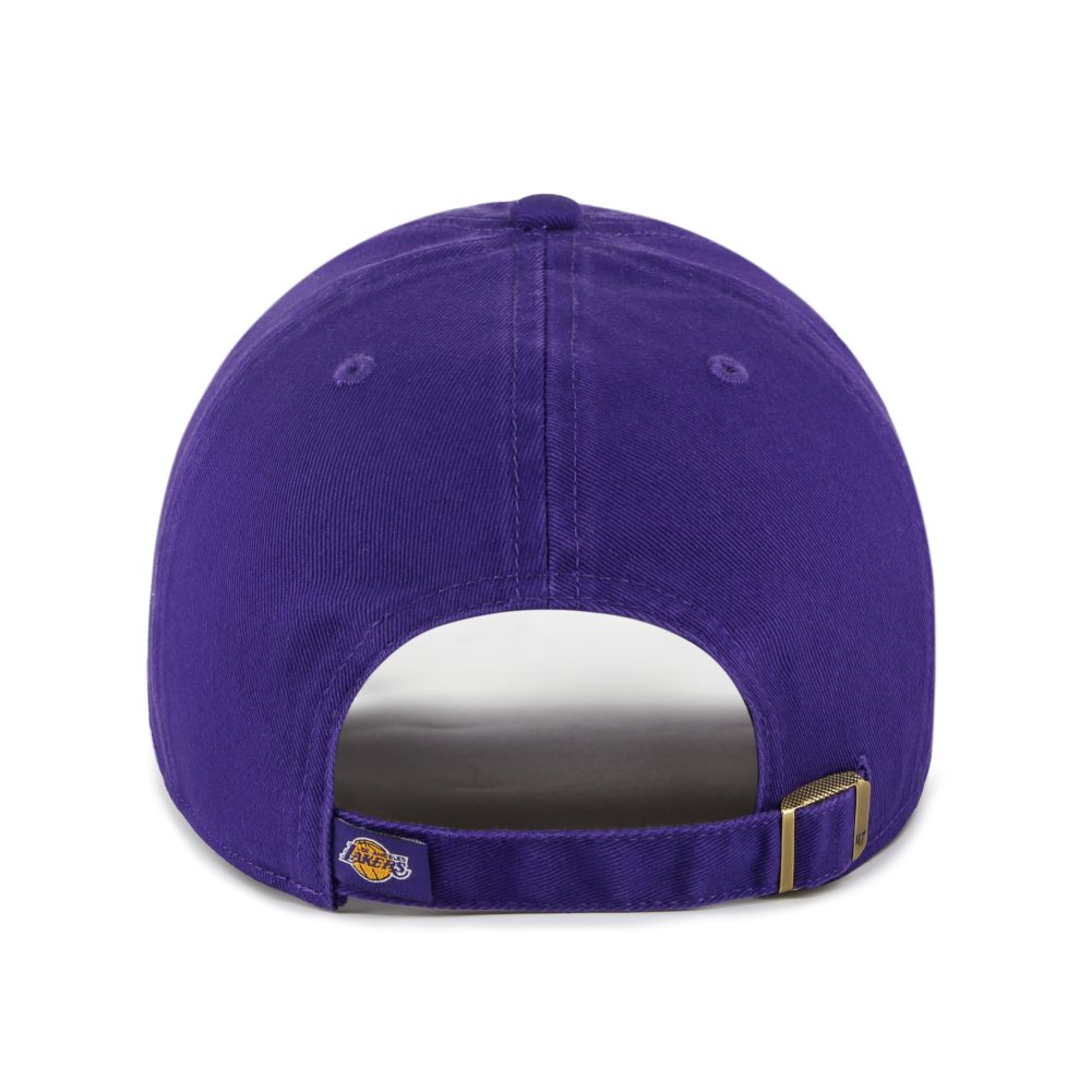 The Los Angeles Lakers '47 Clean Up Cap is a purple cotton twill cap shown from the back, featuring an adjustable strapback with a gold buckle and a small team logo near the opening.