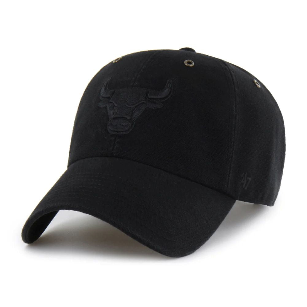 The Chicago Bulls '47 Clean Up Cap is a black cotton twill hat with an embroidered bull logo on the front, ventilation eyelets on each panel, and a subtle '47 logo stitched on the left near the adjustable strapback.