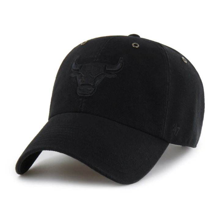 The Chicago Bulls '47 Clean Up Cap is a black cotton twill hat with an embroidered bull logo on the front, ventilation eyelets on each panel, and a subtle '47 logo stitched on the left near the adjustable strapback.
