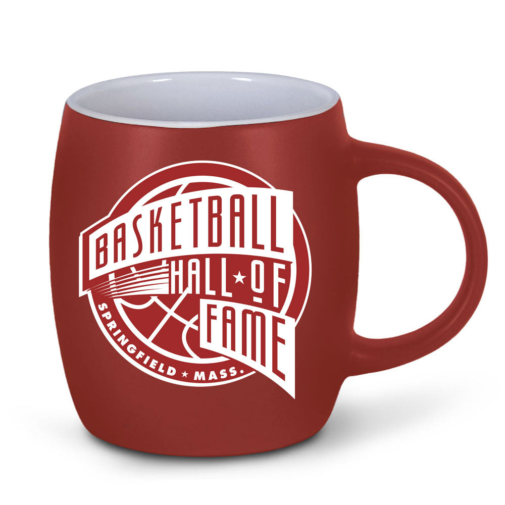 The Basketball Hall of Fame Etched Mug features a red ceramic design with a white logo, basketball graphic, and “Springfield, Mass.” text—a great basketball gift for fans and collectors.