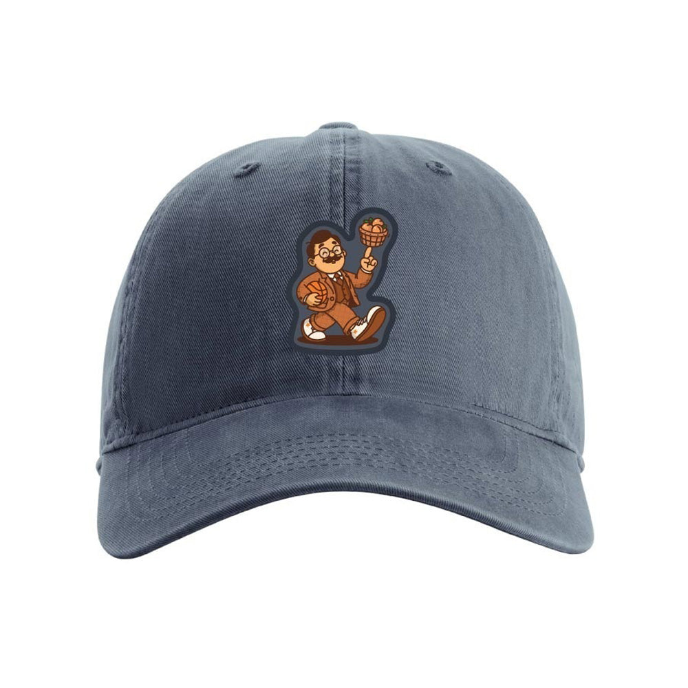 A blue Basketball Hall of Fame® Dr. Naismith Playmaker Youth Cap featuring a cartoon-style patch of a person in glasses spinning a basketball on their finger, designed to capture the playful spirit of the original.