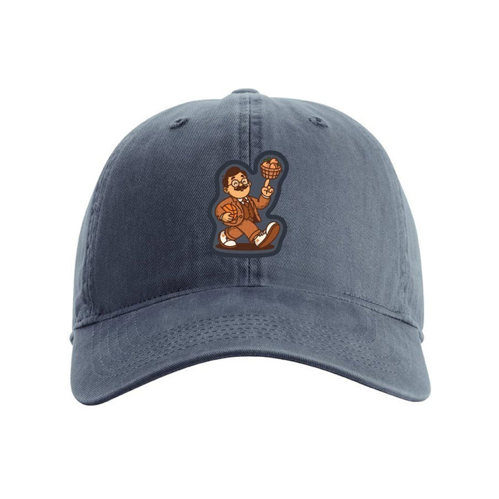 A blue Basketball Hall of Fame® Dr. Naismith Playmaker Youth Cap featuring a cartoon-style patch of a person in glasses spinning a basketball on their finger, designed to capture the playful spirit of the original.