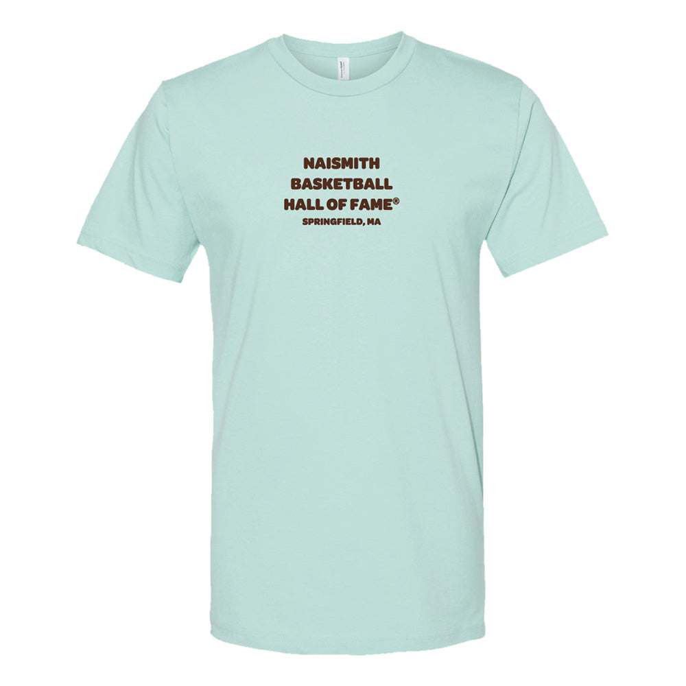 Show your love for basketball history with the Basketball Hall of Fame® Dr. Naismith Playmaker T-Shirt, featuring light blue fabric and “NAISMITH BASKETBALL HALL OF FAME SPRINGFIELD, MA” in bold brown lettering centered on the front—a must-have for fans.