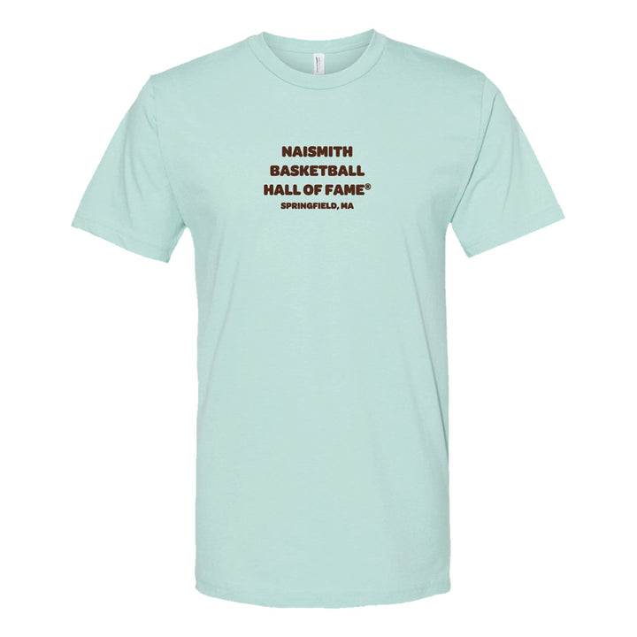 Show your love for basketball history with the Basketball Hall of Fame® Dr. Naismith Playmaker T-Shirt, featuring light blue fabric and “NAISMITH BASKETBALL HALL OF FAME SPRINGFIELD, MA” in bold brown lettering centered on the front—a must-have for fans.