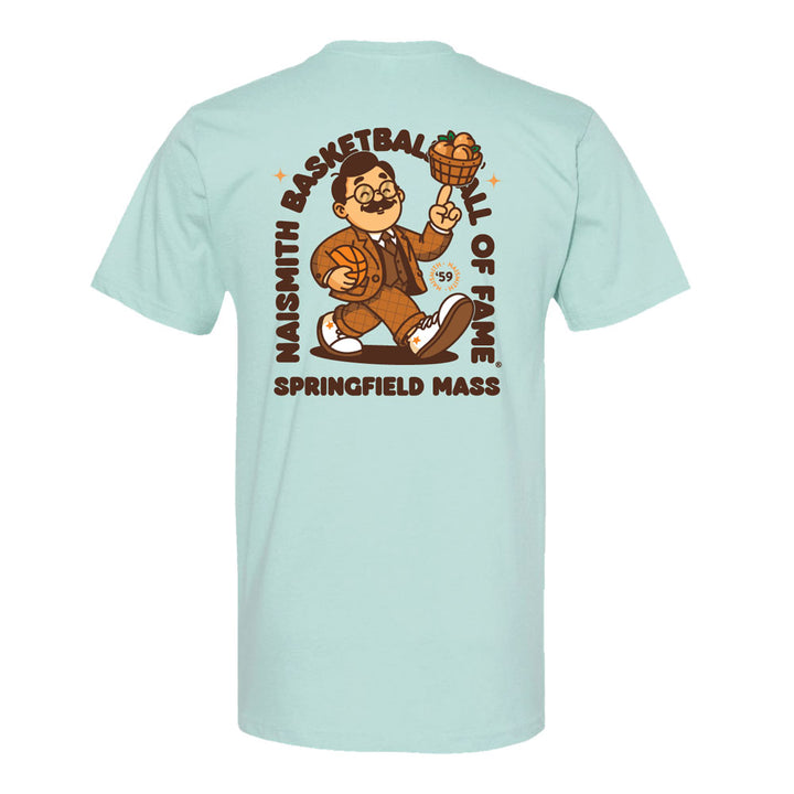 The Basketball Hall of Fame® Dr. Naismith Playmaker T-Shirt in light blue features a cartoon man holding a basketball, with “Naismith Basketball Hall of Fame Springfield Mass” printed in brown lettering around the image—a perfect tribute to basketball history.