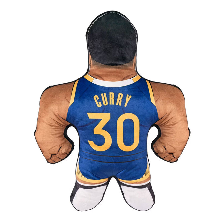 The NBA Golden State Warriors Steph Curry Bleacher Buddy is a plush pillow shaped like a muscular basketball player in a blue and yellow Warriors jersey with CURRY and 30 on the back, set against a white background.