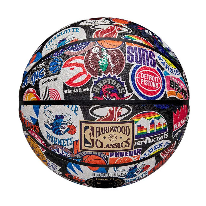 The Wilson NBA All Team Retro Basketball features colorful team logos and the Hardwood Classics emblem on a white background—ideal for fans who love vintage basketball style.