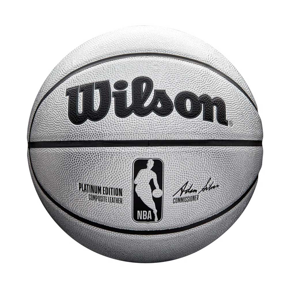 The Wilson NBA Platinum Edition Basketball in silver features the NBA logo, PLATINUM EDITION Composite Leather text, and the commissioner's black signature, providing exceptional grip for premium play.