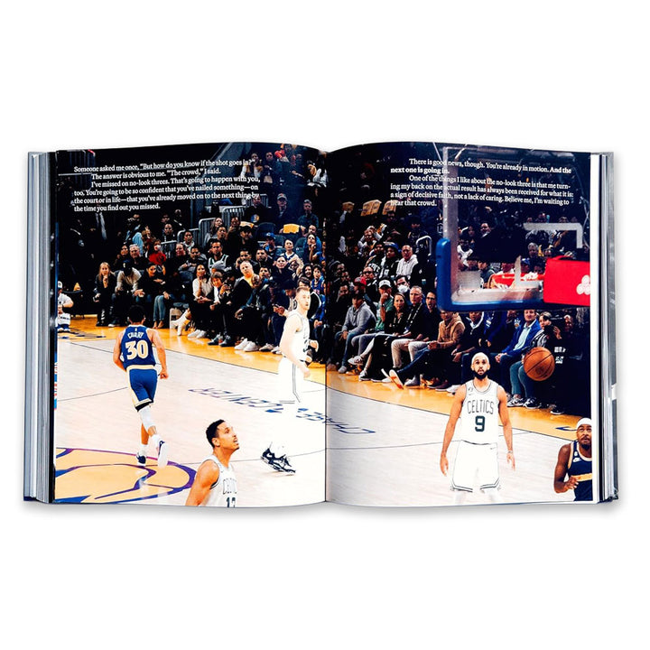 The Shot Ready book, inspired by the philosophy of success, features a scene where Golden State Warriors and Boston Celtics players play basketball as the audience watches, with a Celtics player in a Shot Ready stance shooting at the hoop.
