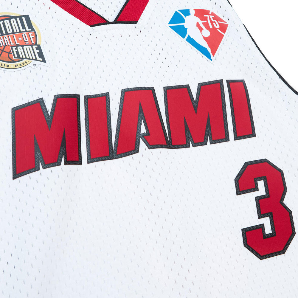 Close-up of the NBA Mitchell & Ness Swing Hall of Fame Miami Heat Dwyane Wade Jersey, showcasing bold red MIAMI lettering, number 3, a Hall of Fame patch, and the NBA 75th anniversary diamond logo.